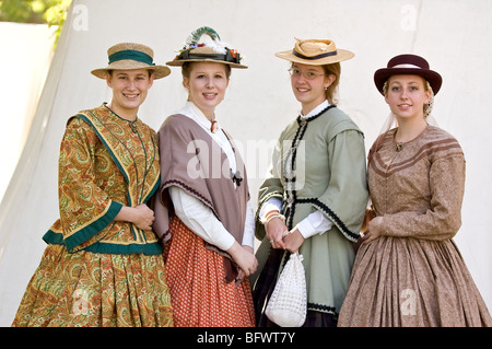 Scenes from a Civil War re-enactment of the Battle of Gettysburg; four young women in period dress Stock Photo