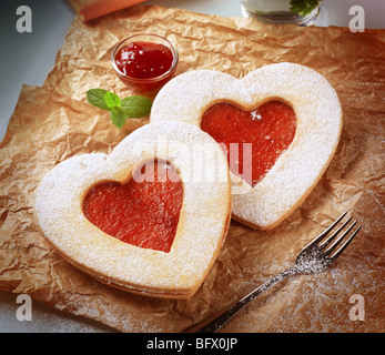 Heart shaped shortbread cookies with jam filling Stock Photo
