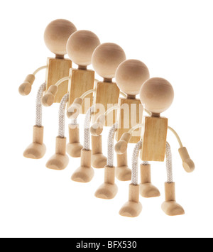 Row of Wooden Figures Stock Photo