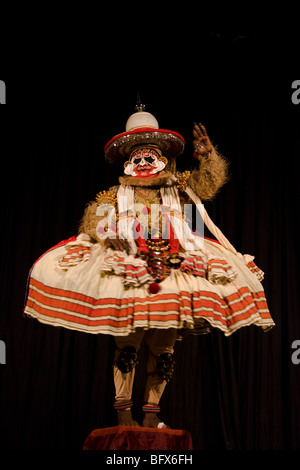 Hanuman, king of  the monkeys, a character in a Kathakali play, performing in a theatre in Trivandrum, Kerala, India Stock Photo