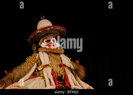 Hanuman, king of  the monkeys, a character in a Kathakali play, performing in a theatre in Trivandrum, Kerala, India Stock Photo