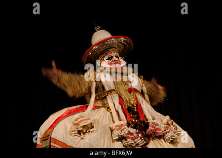 Hanuman, king of  the monkeys, a character in a Kathakali play, performing in a theatre in Trivandrum, Kerala, India Stock Photo