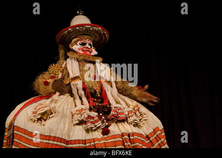 Hanuman, king of  the monkeys, a character in a Kathakali play, performing in a theatre in Trivandrum, Kerala, India Stock Photo