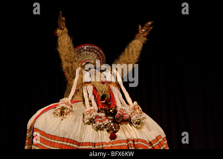 Hanuman, king of  the monkeys, a character in a Kathakali play, performing in a theatre in Trivandrum, Kerala, India Stock Photo