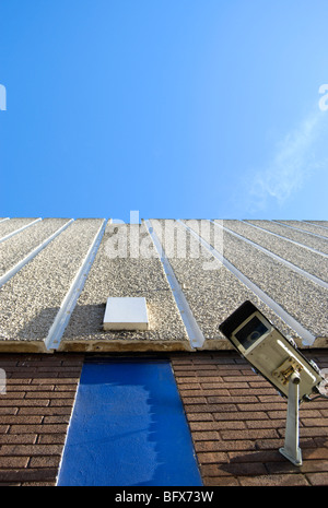 cctv camera fixed to wall of building Stock Photo