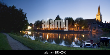 Reflection of St Helen's church spire and Saint Helen's Wharf on the River Thames at Dusk in Abingdon, Oxfordshire, Uk Stock Photo