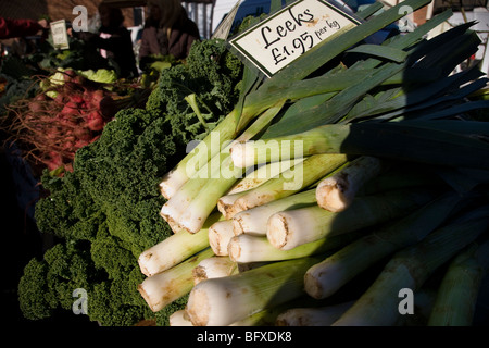 Close-up of leeks, brocolli and other vegetables on a market stall. Stock Photo
