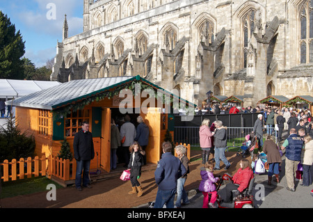 Winchester Christmas market 2009 in the cathedral close with 91 stalls and an ice rink. Stock Photo