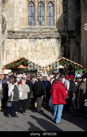 Winchester Christmas market 2009 in the cathedral close with 91 stalls and an ice rink. Stock Photo