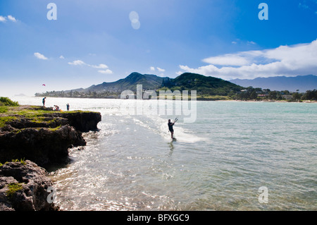 Woman kitesurfing in Kailua Bay, Oahu, Hawaii Stock Photo