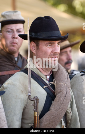 Scenes from a Civil War re-enactment of the Battle of Gettysburg; Confederate soldier standing at attention. Stock Photo