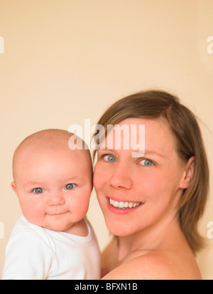 His Mothers Pride And Joy Closeup Of A Baby Boy Looking Over His