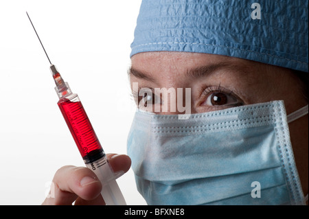 medical technician and hypodermic needle in hospital lab Stock Photo