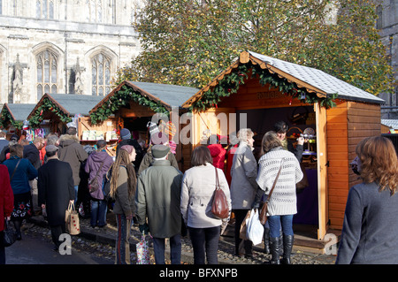 Winchester Christmas market 2009 in the cathedral close with 91 stalls and an ice rink. Stock Photo