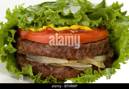 Double Burger in lettuce on white background Stock Photo