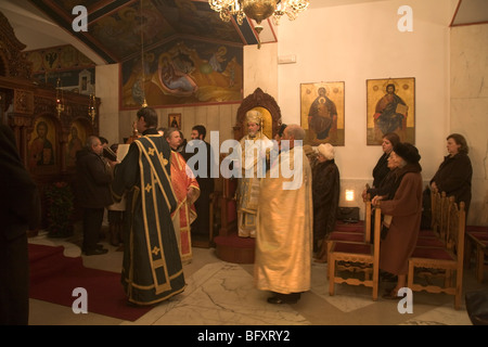 Priest Reading Prayer During Sunday Service Attended by Greek Orthodox Community Rome Italy Stock Photo