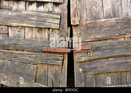 small opening in a wooden door Stock Photo
