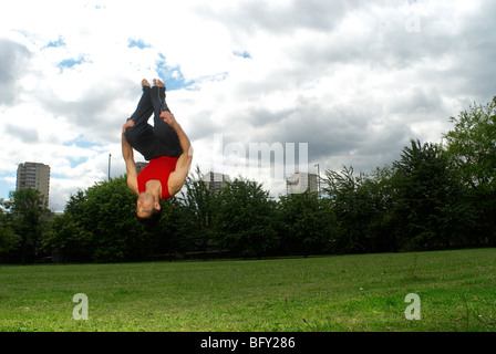 somersault in park Stock Photo