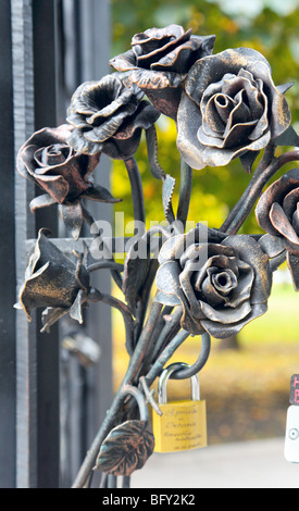 forged rose bouquet and padlock in public 'Park of forged figures' in center of Donetsk City (Ukraine) Stock Photo