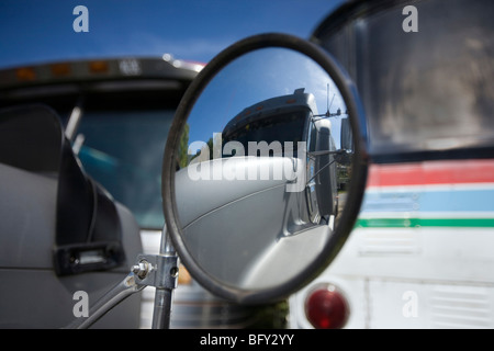 Heavy truck reflecting in mirror Stock Photo