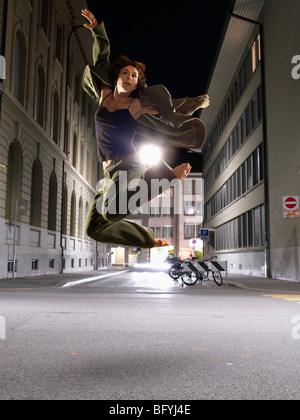 Woman dancer dancing in the streets Stock Photo