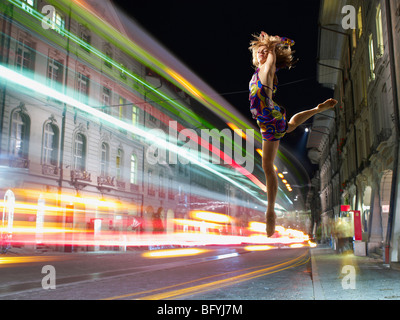 Woman dancer dancing in the streets Stock Photo