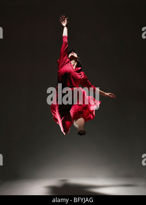 Woman with red dress Stock Photo - Alamy