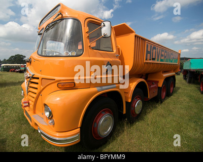 Wide angle shot of an orange Foden S21 Hoveringham tipper seen in 2009 at the Hollowell Steam Rally Stock Photo