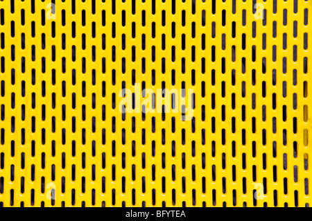 Close up of painted sheet metal and slots as abstract pattern picture Stock Photo