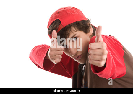 Brave boy shooting from thumbs up isolated on white background Stock Photo