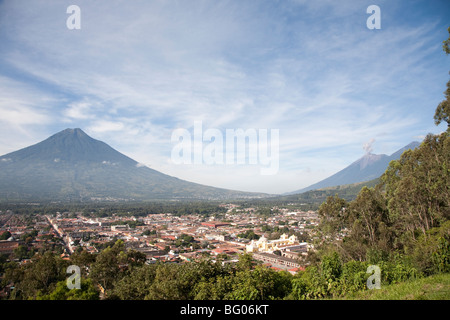 Volcan Agua seen from the cerro de la cruz viewpoint and view over Antigua Guatemala. Stock Photo