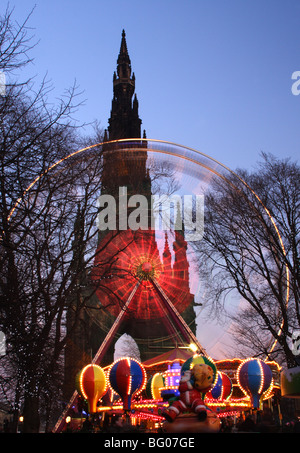 Ferris Wheel in front of Walter Scott Monument, Edinburgh, Scotland Stock Photo