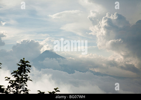 Agua Volcano Summit in thick clouds seen from the Pacaya Volcano. Volcan Pacaya National Park. Stock Photo