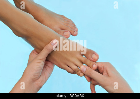 Foot massage Stock Photo