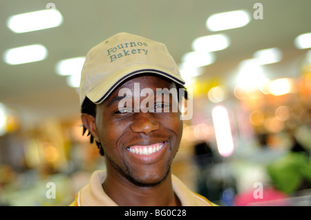 african man working in bakery, tambo international airport, johannesburg Stock Photo