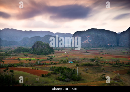 Dusk view across Vinales Valley showing limestone hills known as Mogotes, Vinales, UNESCO World Heritage Site, Cuba, West Indies Stock Photo