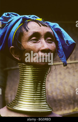 Portrait of a Long Neck woman and member of the Pa Dong tribe in Nai Soi near Mae Hong Son, Thailand. Often called Giraffe women, these women start wearing brass spiral rings around their necks at around six years ols. This tradition for these refugees from Myanmar started to die out until they realizes they could make money from tourists who wanted to photograph them Stock Photo