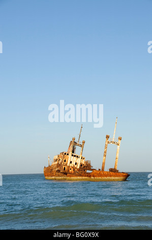 Ship wreck just off the beach near the Royal Lodge, Sine Saloum Delta, Senegal, West Africa, Africa Stock Photo