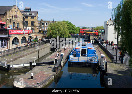 Boat going through Camden Lock, London, England, United Kingdom, Europe Stock Photo