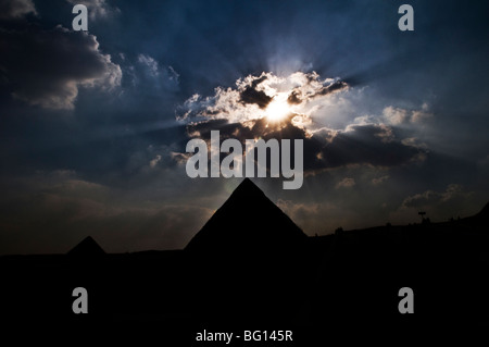 Sunset over the great Pyramids of Giza. Stock Photo