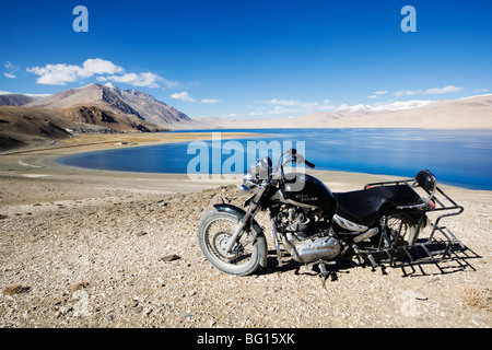 Royal Enfield motorbike near Lake Tsomoriri in Himalayan mountains, Ladakh, India. Stock Photo