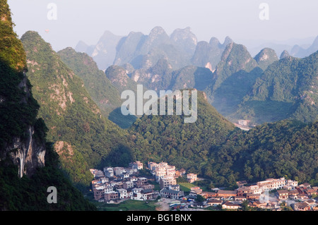 Karst limestone scenery surrounding a village in Yangshuo, near Guilin, Guangxi Province, China, Asia Stock Photo