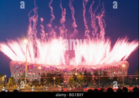 Fireworks on the Birds Nest National Stadium during the opening ceremony of the 2008 Olympic Games, Beijing, China, Asia Stock Photo