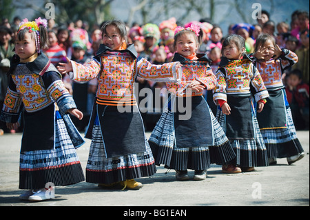 Girls in ethnic costume at a 4 Seals Miao lunar New Year festival, Xinyao village, Guizhou Province, China, Asia Stock Photo