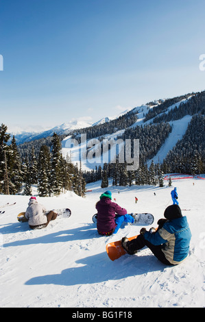 Snowboarders at Whistler mountain resort, venue of the 2010 Winter Olympic Games, British Columbia, Canada, North America Stock Photo
