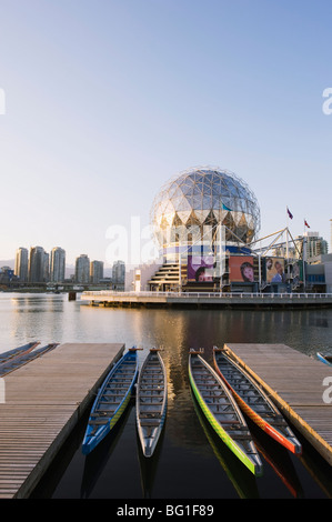 Colourful rowing boats in front of Telus Science World, on False Creek, Vancouver, British Columbia, Canada, North America Stock Photo