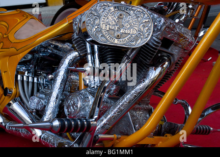 Engine detail of custom built, classic Harley-Davidson motorcycle with an abundance of ornamented chrome. Stock Photo