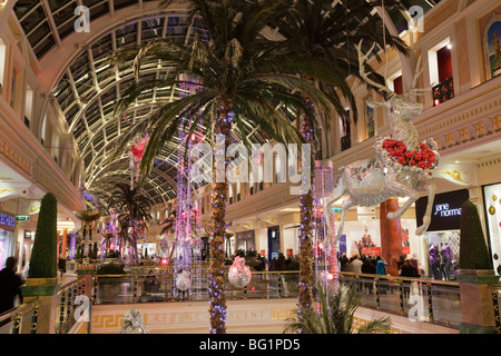 UK, England, Manchester, Trafford Centre, shopping mall decorated for Christmas flying reindeer decorations Stock Photo