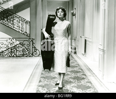 LOVE IN THE AFTERNOON  1957 Allied Artist film with Audrey Hepburn as Ariane Chavasse with her cello Stock Photo