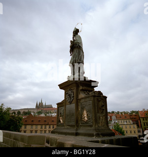 World Travel. Statue Saint John of Nepomuk on Charles Bridge in Prague in the Czech Republic in Eastern Europe. Culture History Traveller Wanderlust Stock Photo
